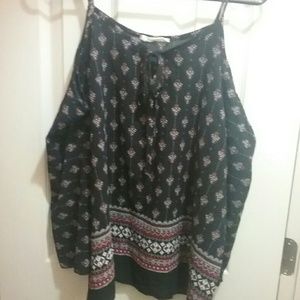 Long sleeved, shoulder showing blouse